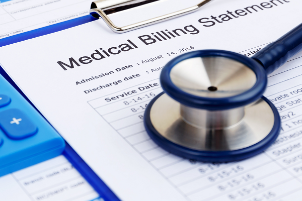 Stethoscope on medical bill